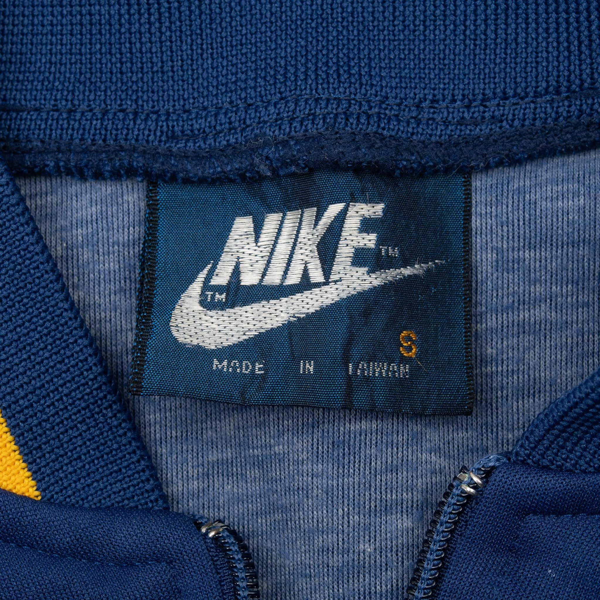 VINTAGE NIKE BLUE TRACK JACKET EARLY 1980S SMALL