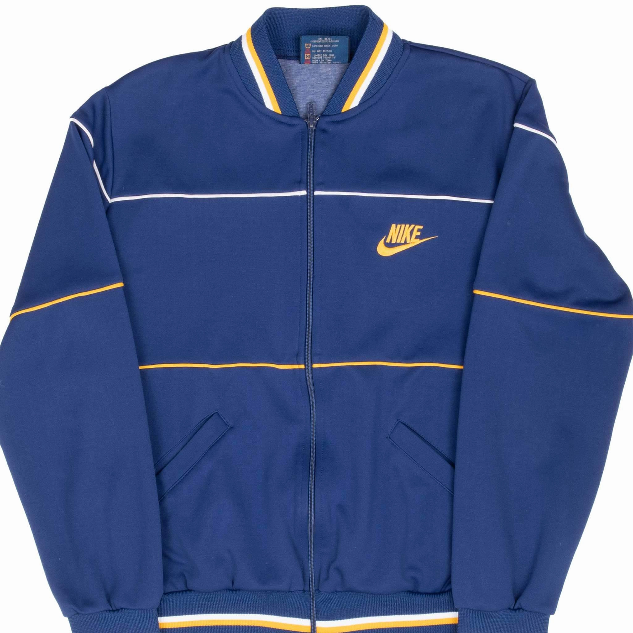VINTAGE NIKE BLUE TRACK JACKET EARLY 1980S SMALL